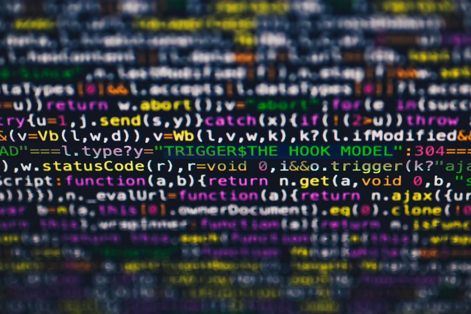 Código de programación multicolor en primer plano sobre un monitor, representando la sintaxis y estructura del software. Código de programación multicolor en primer plano sobre un monitor, representando la sintaxis y estructura del software.